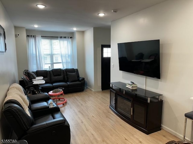 86 N 7th St, Paterson City, NJ 07522 - living area featuring light wood-style floors, baseboards, and recessed lighting