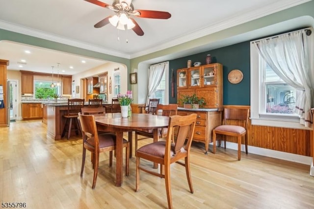 29 Rutgers St, Maplewood Twp, NJ 07040 - dining room featuring plenty of natural light, light wood-style floors, wainscoting, ornamental molding, and ceiling fan