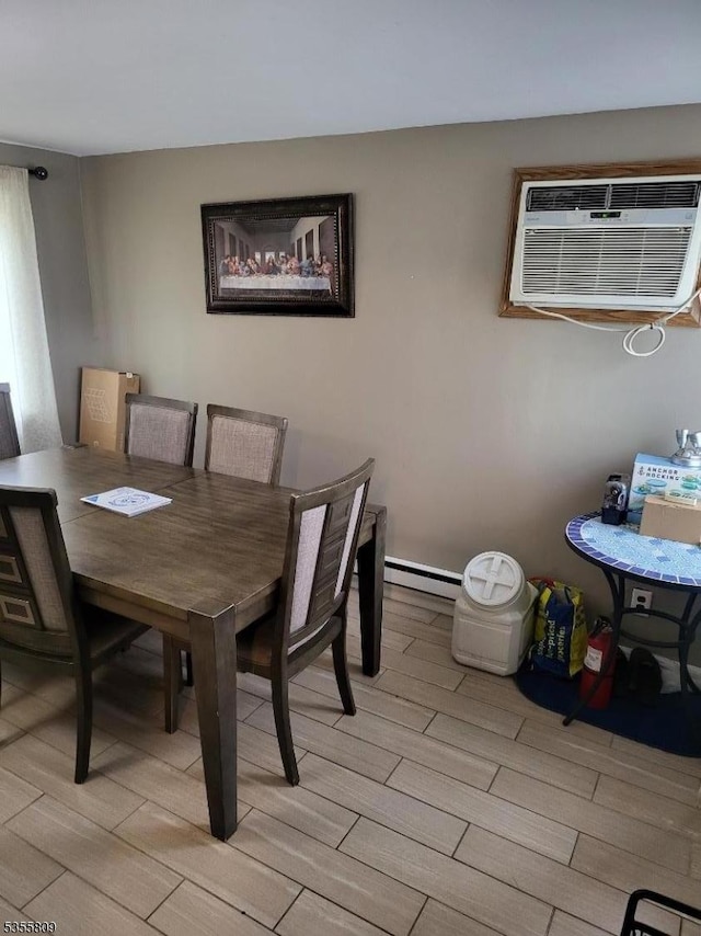 68 Echo Pl, Elmwood Park Boro, NJ 07407 - dining room featuring wood tiled floors, an AC wall unit, and baseboard heating