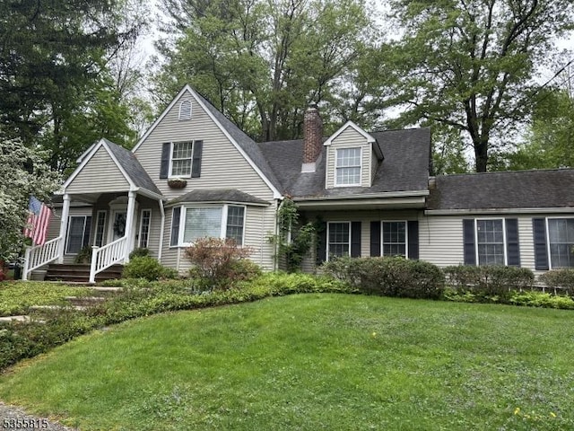1078 Mountain Ave, Berkeley Heights Twp, NJ 07922 - view of front facade with a chimney and a front lawn