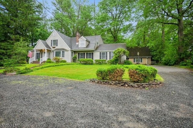 1078 Mountain Ave, Berkeley Heights Twp, NJ 07922 - view of front of house with a front yard, a chimney, and gravel driveway
