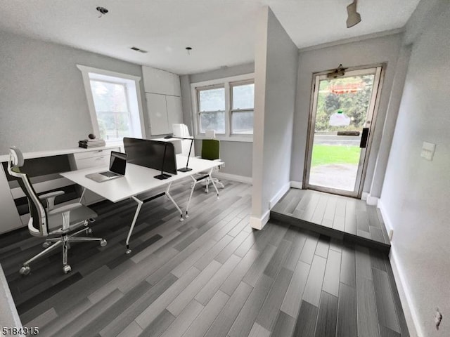 office featuring baseboards, dark wood-style floors, and visible vents
