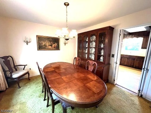 7 Fairhaven Dr, Parsippany-Troy Hills Twp, NJ 07950 - carpeted dining space featuring a chandelier