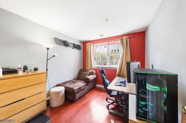 office area with wood finished floors