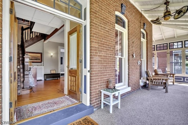 128 W High St, Somerville Boro, NJ 08876 - entrance to property with brick siding, a porch, and a ceiling fan