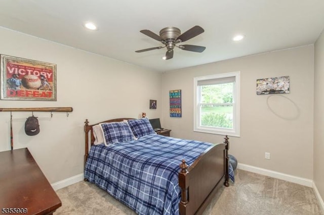 carpeted bedroom featuring baseboards, recessed lighting, and ceiling fan