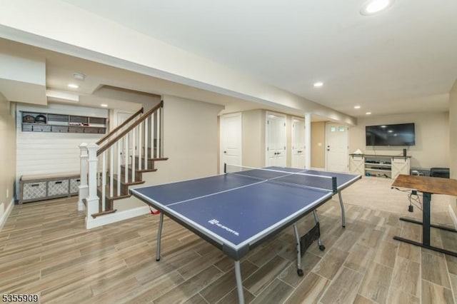 rec room with wood finished floors, baseboards, and recessed lighting