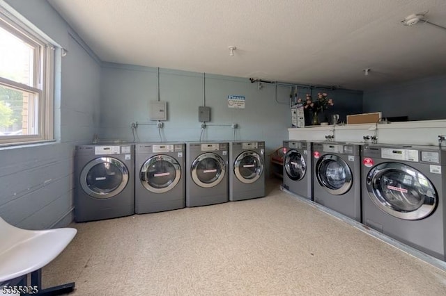 community laundry with separate washer and dryer
