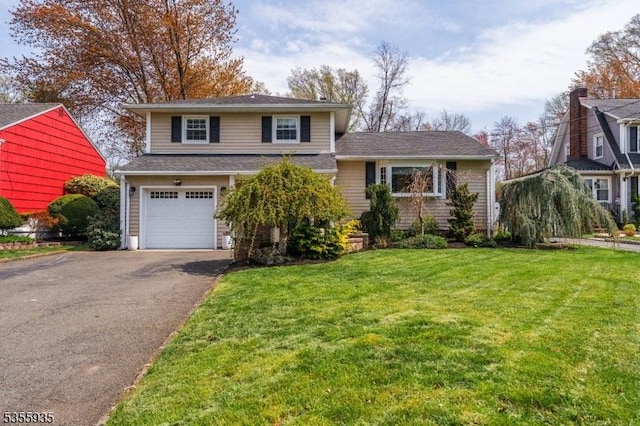 74 Emerald Pl, Clark Twp, NJ 07066 - split level home with asphalt driveway, an attached garage, and a front yard