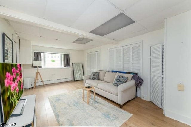 7 Capstan Rd, West Milford Twp, NJ 07480 - living room with baseboard heating, light wood-type flooring, and baseboards