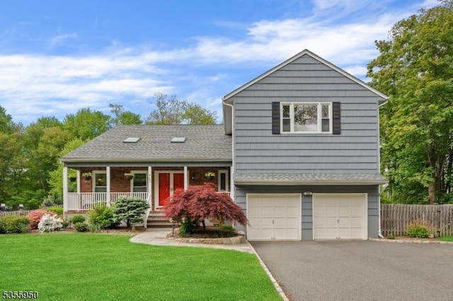 53 Woodland Ave, Morris Twp, NJ 07960 - tri-level home with covered porch, asphalt driveway, and an attached garage