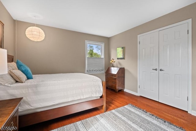 53 Woodland Ave, Morris Twp, NJ 07960 - bedroom featuring wood finished floors, baseboards, and a closet
