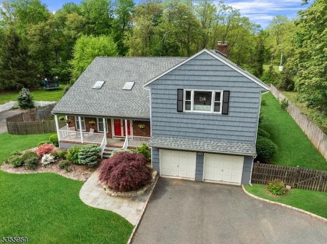 53 Woodland Ave, Morris Twp, NJ 07960 - view of front of home featuring a chimney, asphalt driveway, a garage, a porch, and a shingled roof