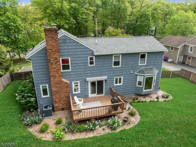 53 Woodland Ave, Morris Twp, NJ 07960 - rear view of house featuring a chimney, a wooden deck, cooling unit, and a shingled roof