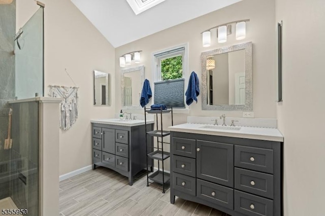 53 Woodland Ave, Morris Twp, NJ 07960 - bathroom with a stall shower, lofted ceiling, a skylight, two vanities, and wood finish floors