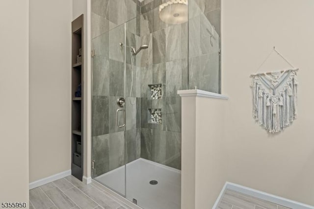 53 Woodland Ave, Morris Twp, NJ 07960 - bathroom featuring a shower stall and baseboards