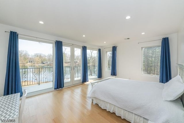 34 W Shore Rd, Mountain Lakes Boro, NJ 07046 - bedroom featuring access to exterior, multiple windows, french doors, recessed lighting, and wood finished floors