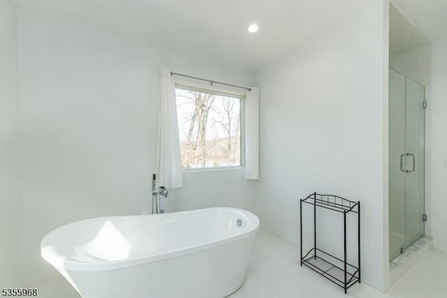34 W Shore Rd, Mountain Lakes Boro, NJ 07046 - bathroom with a stall shower, a freestanding bath, and recessed lighting