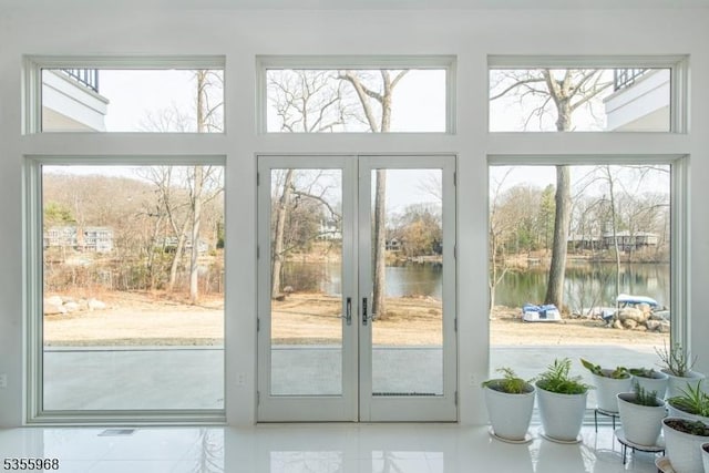 34 W Shore Rd, Mountain Lakes Boro, NJ 07046 - entryway featuring a water view, healthy amount of natural light, and a towering ceiling