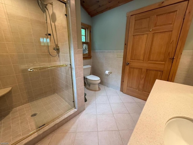 217 Bearfort Rd, West Milford Twp, NJ 07480 - bathroom with tile walls, a stall shower, tile patterned floors, toilet, and vanity