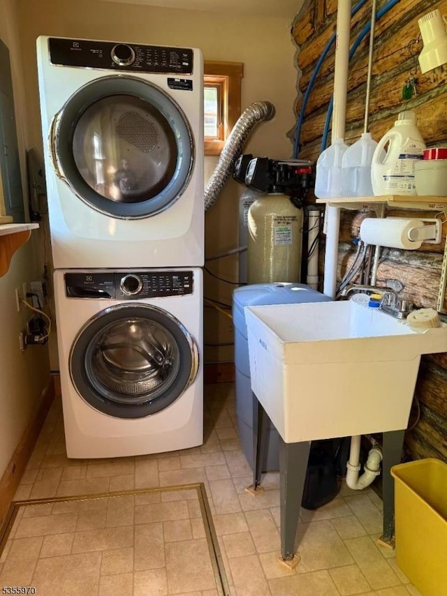 217 Bearfort Rd, West Milford Twp, NJ 07480 - laundry room featuring stacked washer / dryer