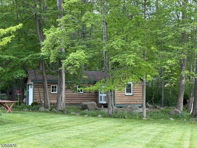 217 Bearfort Rd, West Milford Twp, NJ 07480 - view of green lawn with a wooded view