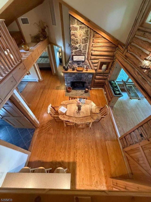 217 Bearfort Rd, West Milford Twp, NJ 07480 - living room with wood finished floors and a stone fireplace