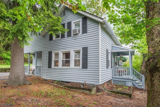 view of home's exterior with a porch