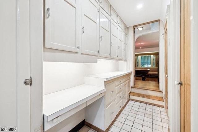 10 Highland Pl, West Orange Twp, NJ 07052 - unfurnished office featuring built in desk and light tile patterned floors