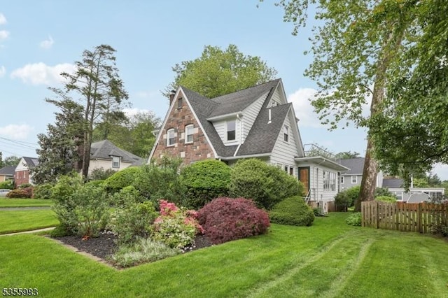 10 Highland Pl, West Orange Twp, NJ 07052 - view of home's exterior featuring a shingled roof
