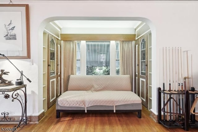 10 Highland Pl, West Orange Twp, NJ 07052 - sitting room featuring arched walkways and wood finished floors