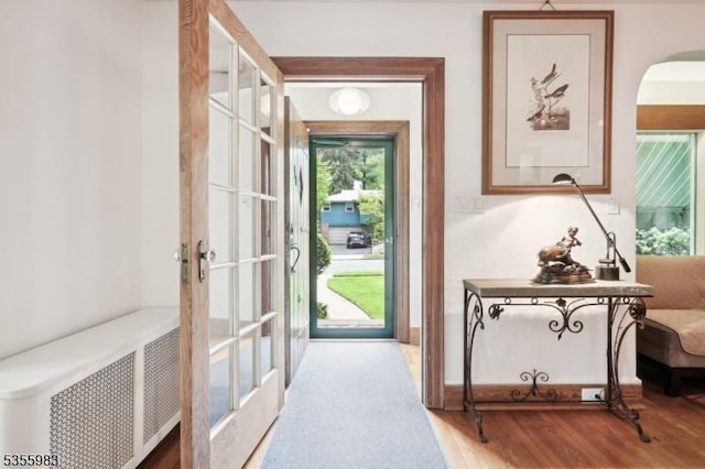 10 Highland Pl, West Orange Twp, NJ 07052 - doorway featuring wood finished floors and arched walkways