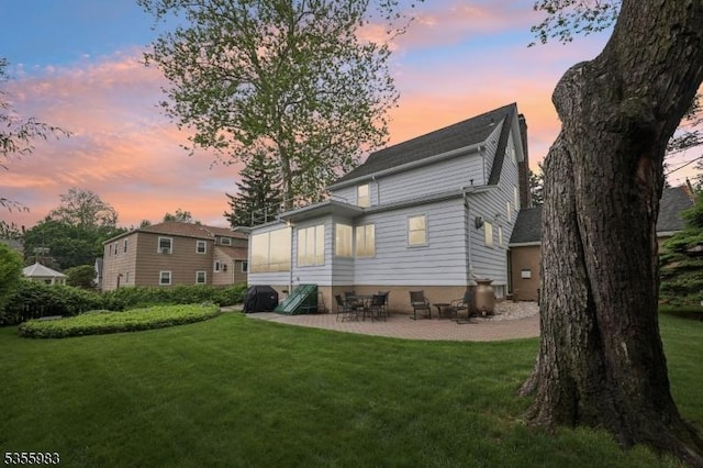 10 Highland Pl, West Orange Twp, NJ 07052 - back of property featuring a yard and a patio area