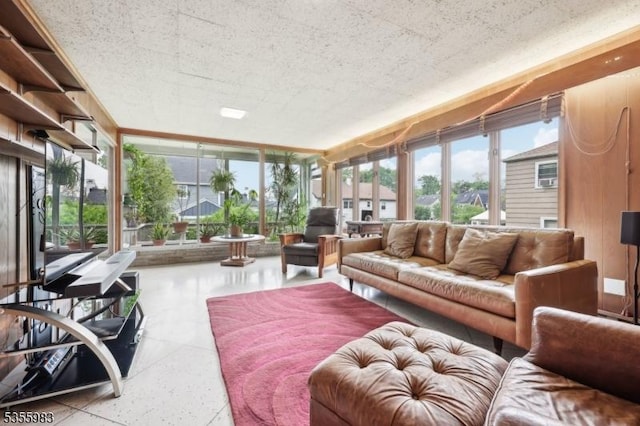 10 Highland Pl, West Orange Twp, NJ 07052 - living room featuring floor to ceiling windows and speckle patterned floor