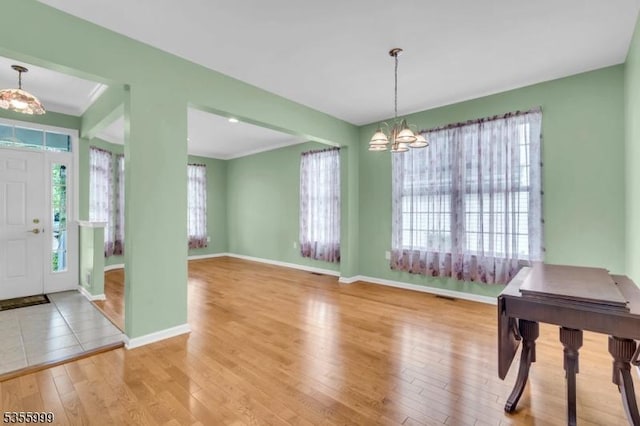 27 Jays Cor, Franklin Twp, NJ 08873 - entrance foyer featuring a chandelier and wood finished floors