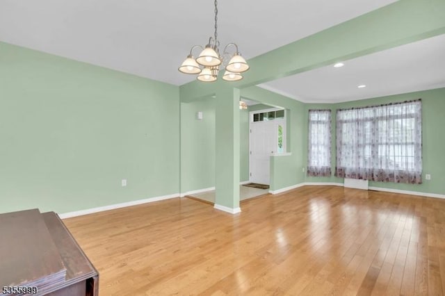 27 Jays Cor, Franklin Twp, NJ 08873 - unfurnished living room featuring a chandelier, wood finished floors, and recessed lighting