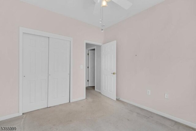 27 Jays Cor, Franklin Twp, NJ 08873 - unfurnished bedroom with carpet, a closet, and a ceiling fan