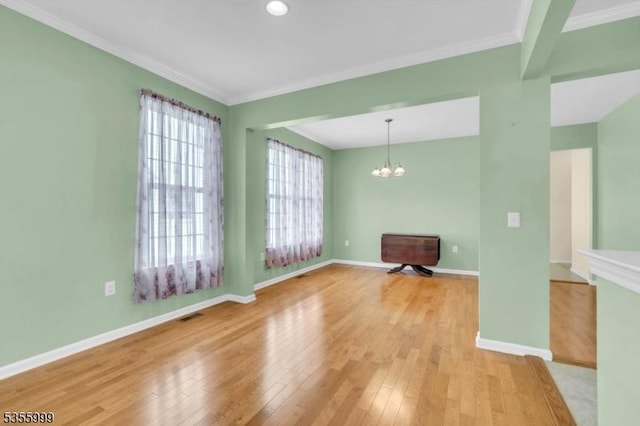 27 Jays Cor, Franklin Twp, NJ 08873 - empty room featuring a chandelier, light wood-style flooring, and ornamental molding
