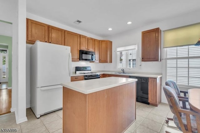 27 Jays Cor, Franklin Twp, NJ 08873 - kitchen featuring black appliances, plenty of natural light, a center island, light countertops, and recessed lighting