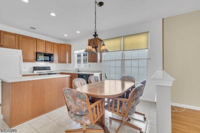 27 Jays Cor, Franklin Twp, NJ 08873 - kitchen featuring black appliances, light countertops, recessed lighting, a chandelier, and hanging light fixtures