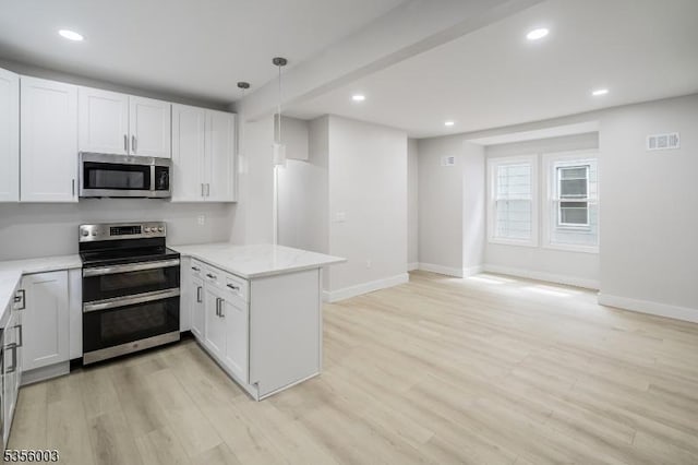 kitchen with appliances with stainless steel finishes, baseboards, light wood-style floors, light stone countertops, and recessed lighting