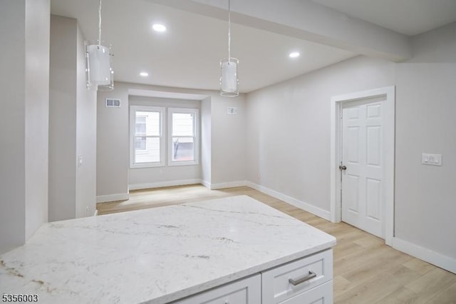 interior space featuring light wood-type flooring, recessed lighting, and baseboards