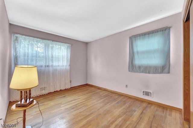 45 Ninth St, Hillsborough Twp, NJ 08821 - empty room featuring wood finished floors and baseboards