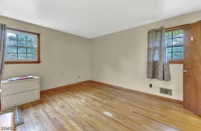 45 Ninth St, Hillsborough Twp, NJ 08821 - unfurnished room with light wood-type flooring and baseboards