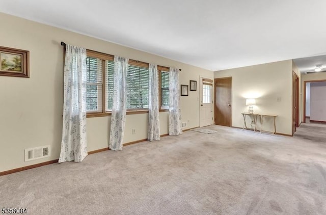45 Ninth St, Hillsborough Twp, NJ 08821 - unfurnished living room with carpet floors and baseboards