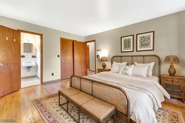 45 Ninth St, Hillsborough Twp, NJ 08821 - bedroom featuring light wood-type flooring and connected bathroom