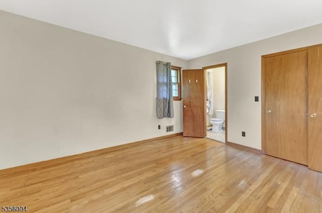 45 Ninth St, Hillsborough Twp, NJ 08821 - unfurnished bedroom featuring light wood-style floors and ensuite bathroom