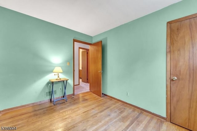 45 Ninth St, Hillsborough Twp, NJ 08821 - unfurnished bedroom with wood finished floors and baseboards