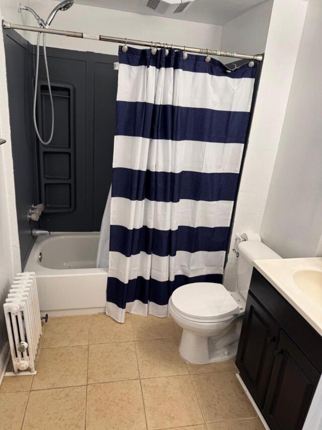 5 Franklin Blvd, Franklin Twp, NJ 08873 - bathroom with radiator, tile patterned floors, vanity, toilet, and shower / bath combo