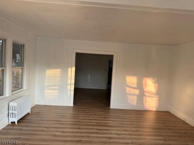 5 Franklin Blvd, Franklin Twp, NJ 08873 - spare room featuring radiator, wood finished floors, and baseboards
